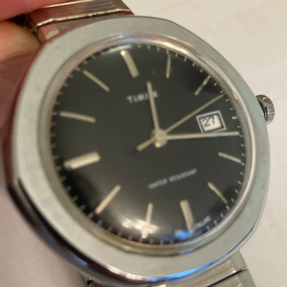 Vintage Timex watch, black dial, domed crystal, 2 straps, 1 leather, 1 stainless